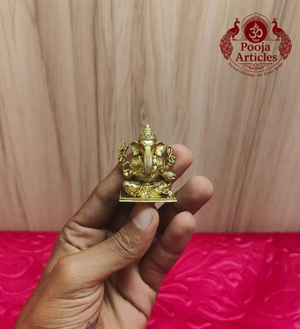 Premium Brass Lord Ganesha Idol 1.7 Inch - front view held in hand